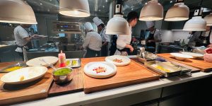 A rare behind-the-scenes culinary experience — dining in the kitchen and witnessing the artistry, passion, and precision behind an exceptional Michelin-starred restaurant.