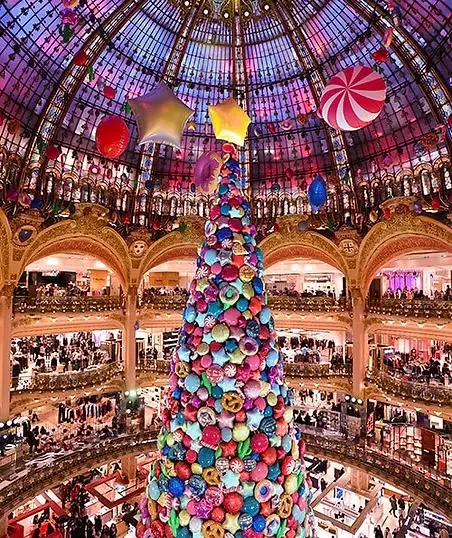 Galeries Lafayette Paris decorated for Christmas with grand tree and Art Nouveau dome, Wine+Magic tour