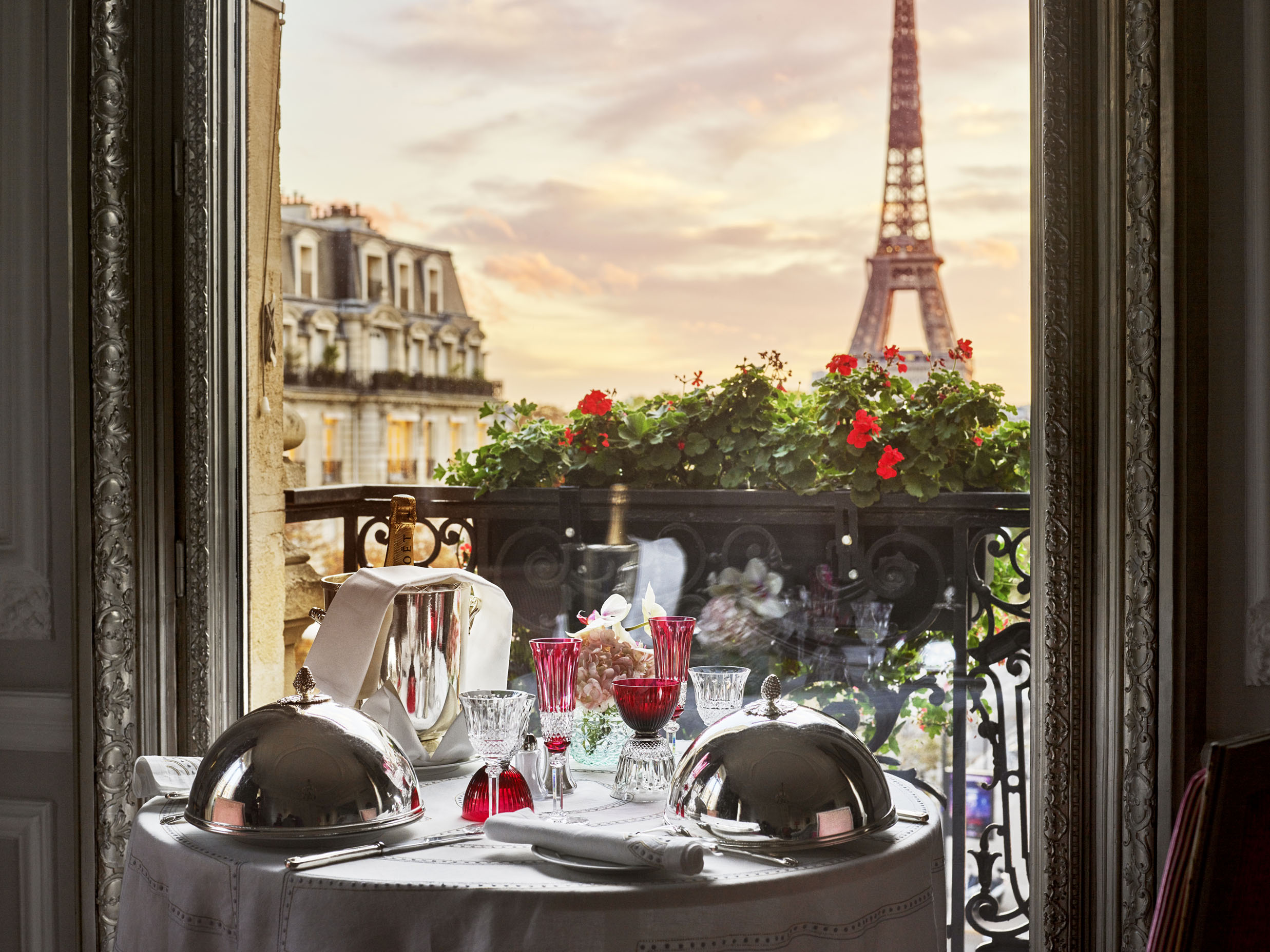 Hotel Plaza Athénée Paris Haute Couture Suite romantic dinner table with Eiffel Tower sunset view, luxury Paris tour, France