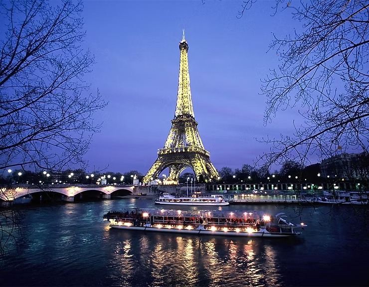 Paris illuminated at night during a private wine and holiday tour