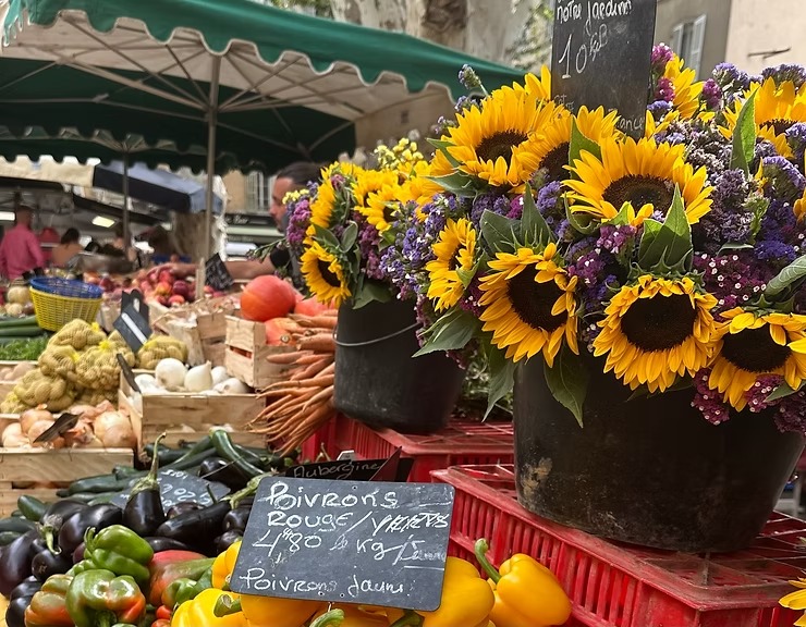 Traditional Provençal market with local produce and wine