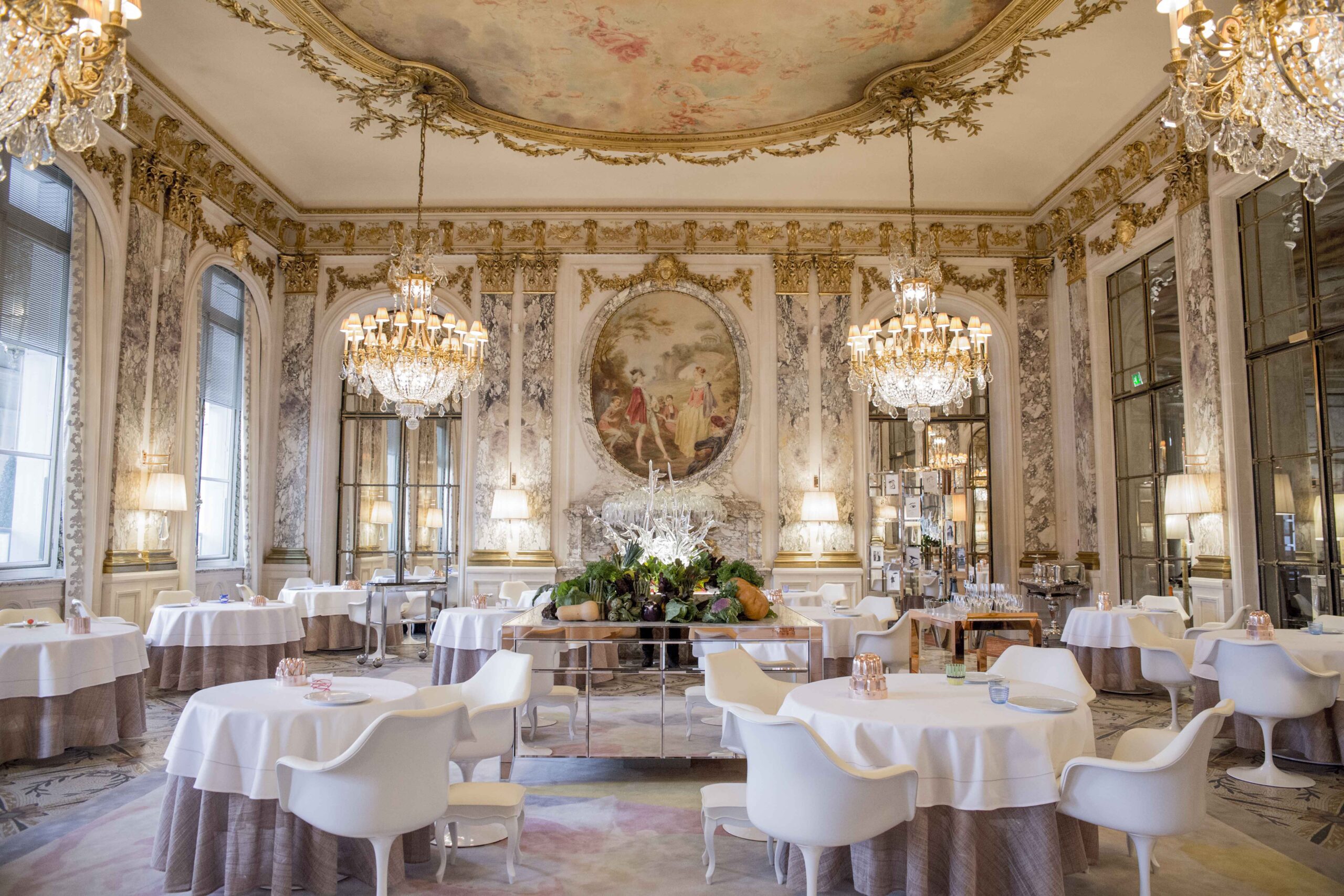 Le Meurice Michelin star restaurant gilded dining room with crystal chandeliers and painted ceiling, luxury Paris, France